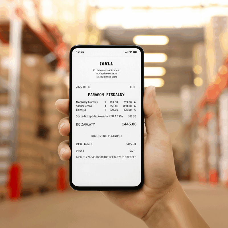 E-paragony w systemie KLL-ERP - telefon z elektronicznym paragonem na tle magazynu
