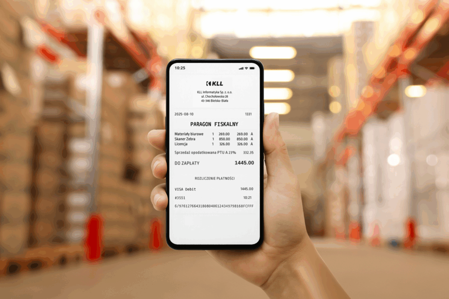 E-paragony w systemie KLL-ERP - telefon z elektronicznym paragonem na tle magazynu